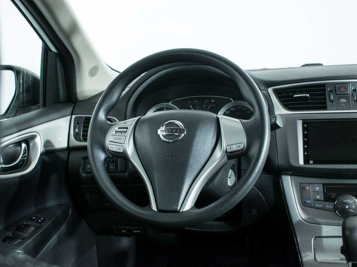 Nissan Tiida с пробегом — 2015 год. Фото: #13