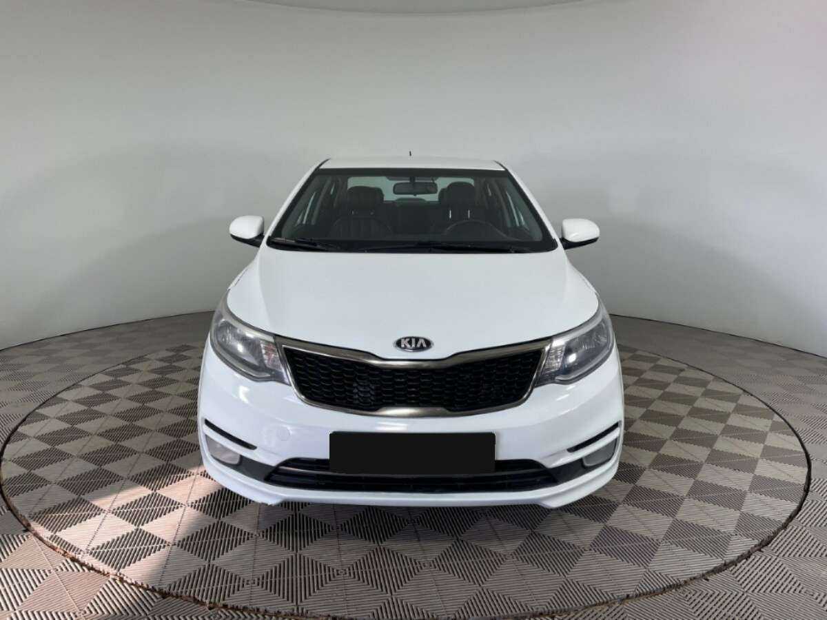 Kia Rio с пробегом — 2015 год. Фото: #1