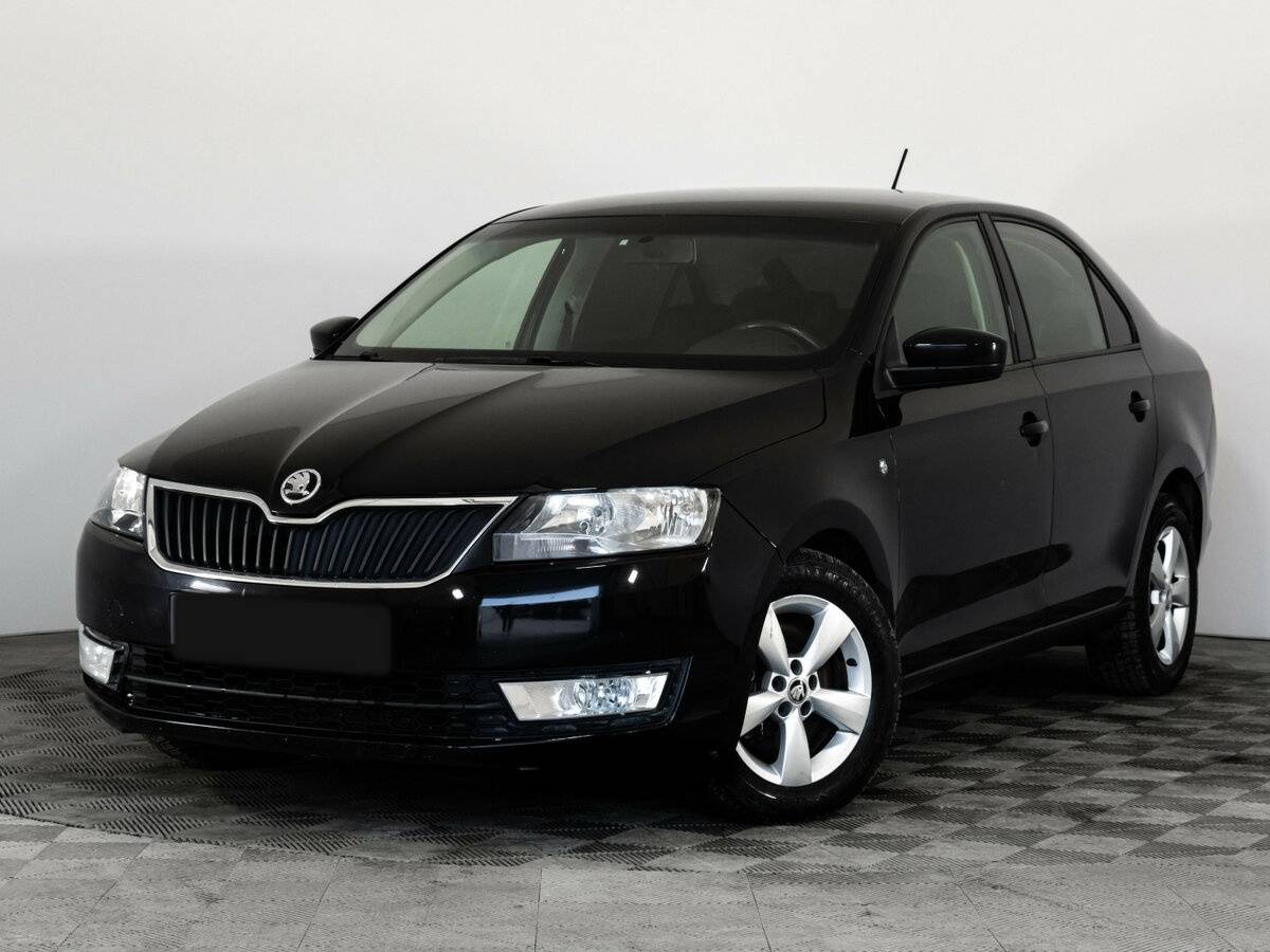 Skoda Rapid с пробегом — 2015 год. Посмотреть фото