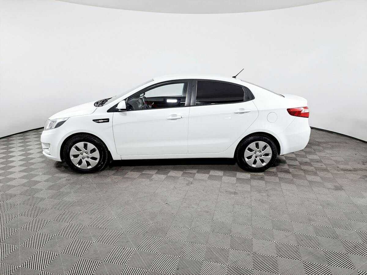 Kia Rio с пробегом — 2013 год. Фото: #7