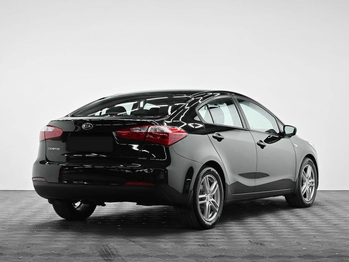 Kia Cerato с пробегом — 2015 год. Фото: #3