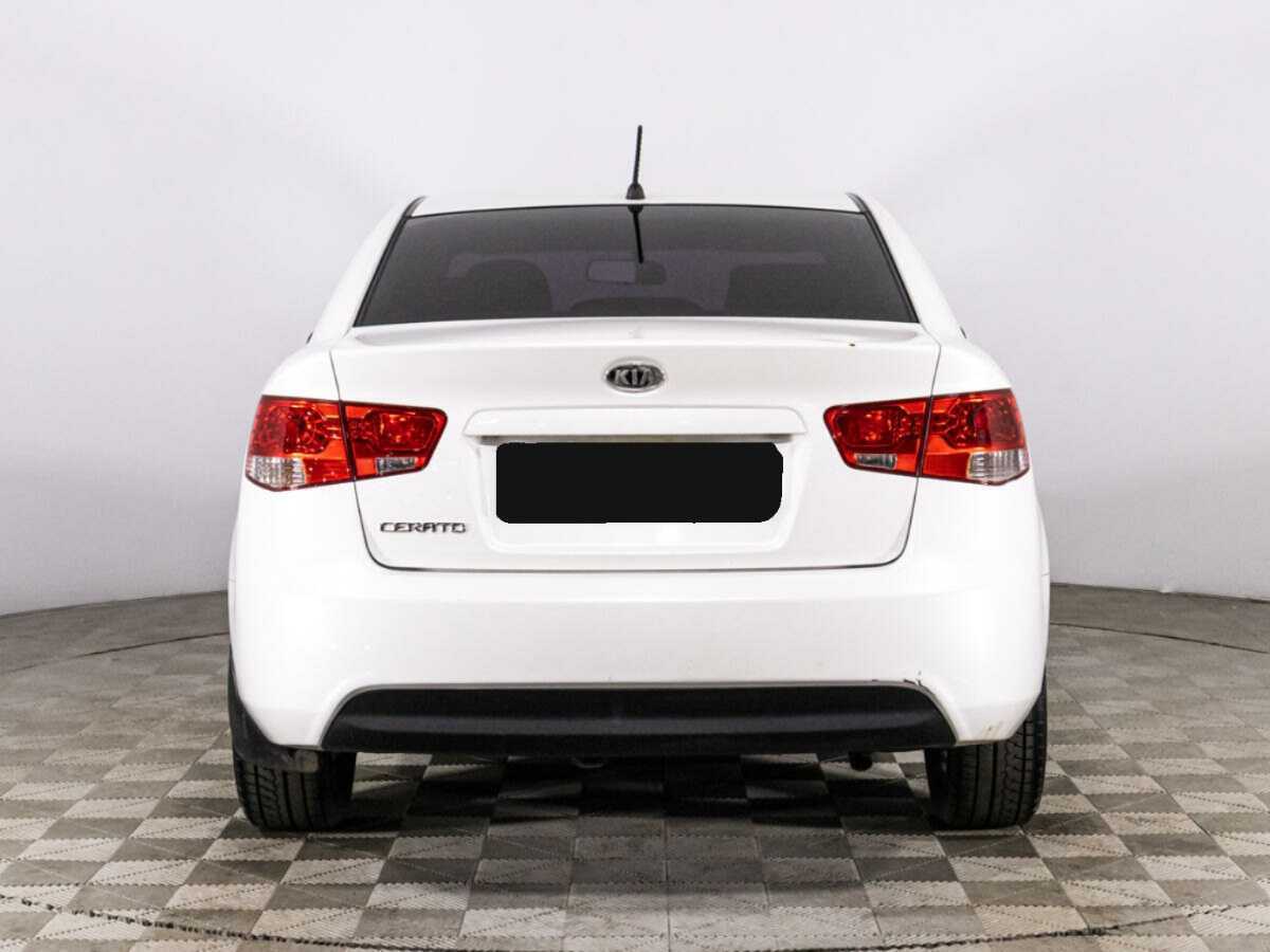 Kia Cerato с пробегом — 2012 год. Фото: #5