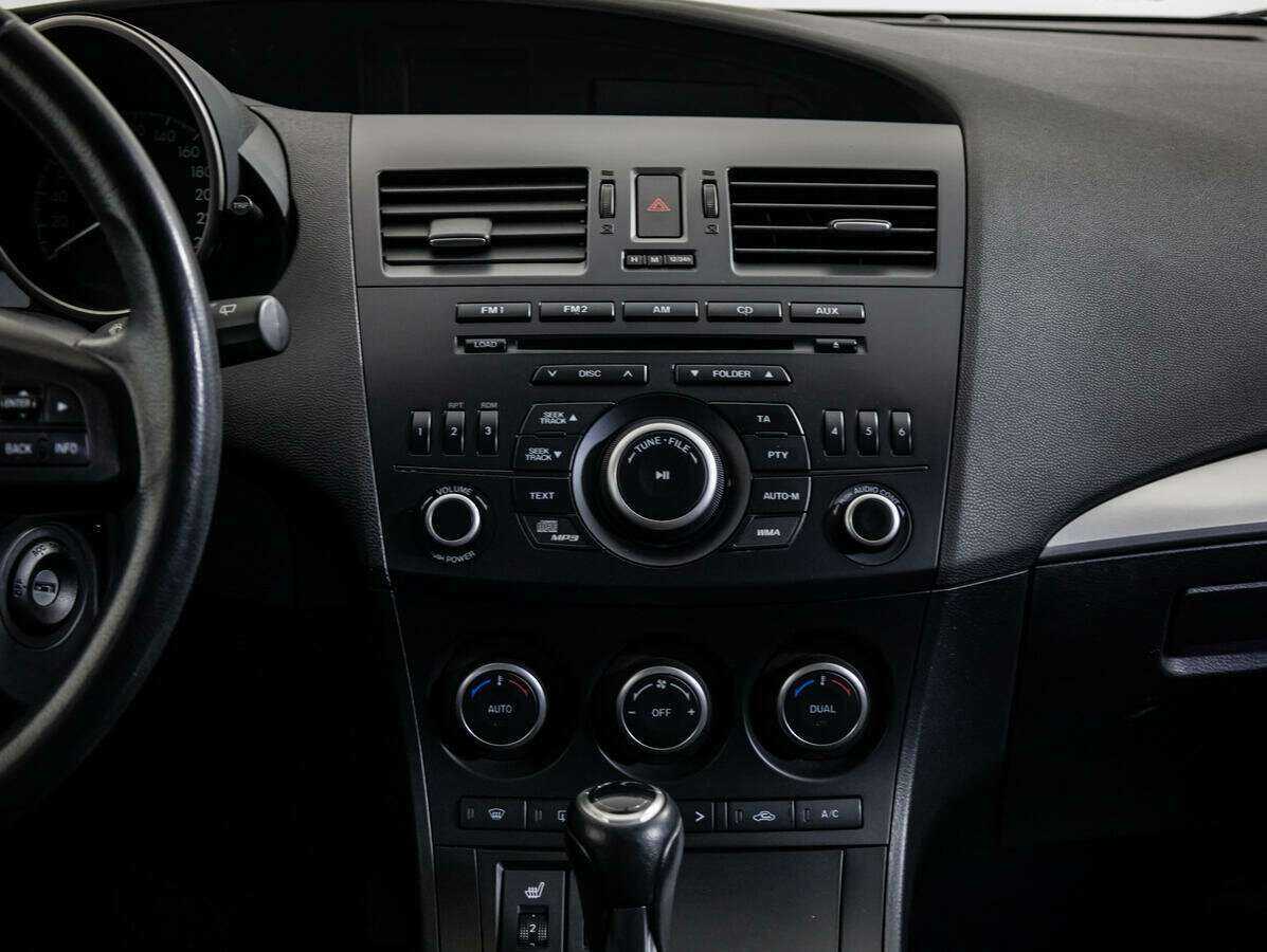 Mazda 3 с пробегом — 2012 год. Фото: #13
