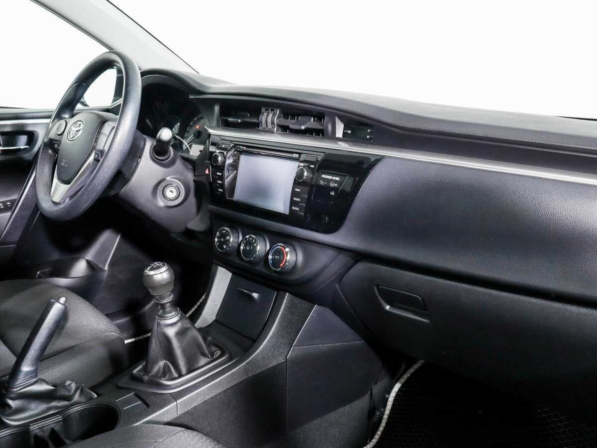 Toyota Corolla с пробегом — 2014 год. Фото: #8