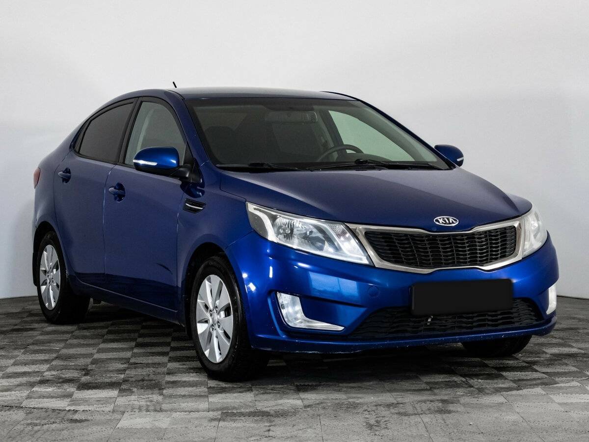 Kia Rio с пробегом — 2012 год. Фото: #2