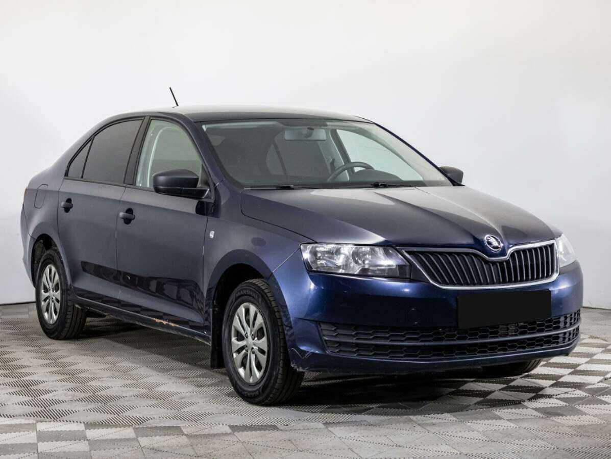 Skoda Rapid с пробегом — 2015 год. Фото: #2