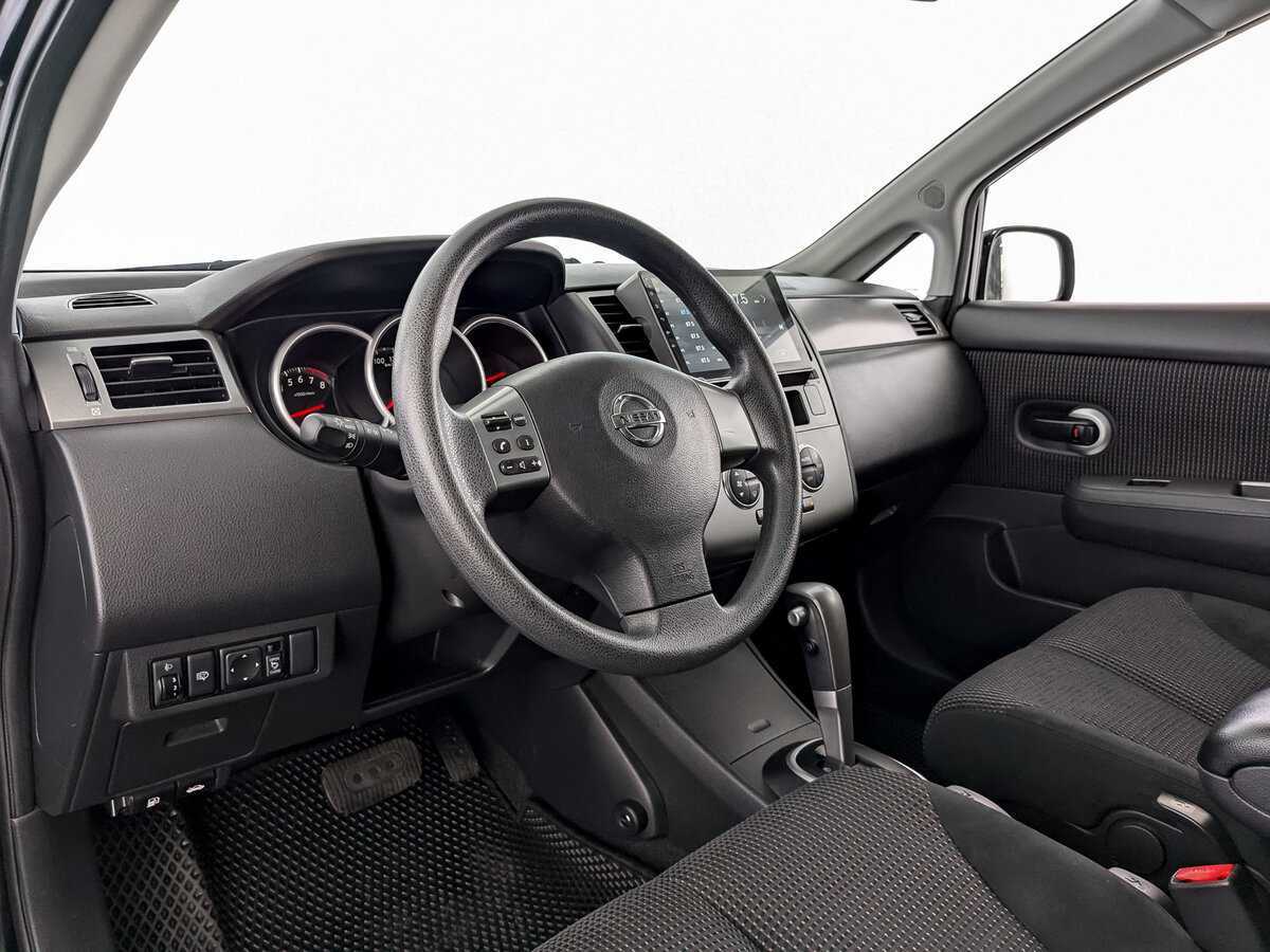 Nissan Tiida с пробегом — 2013 год. Фото: #13