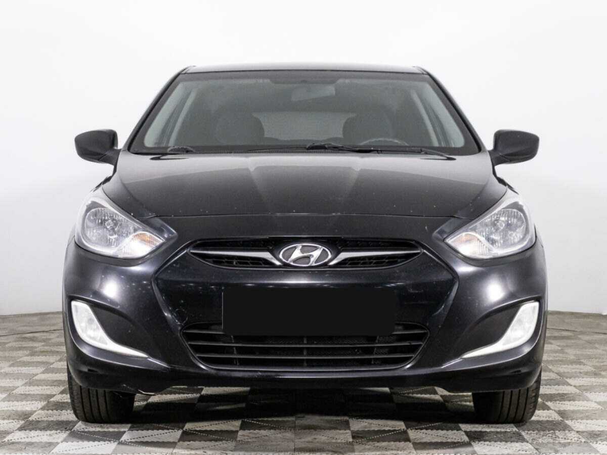 Hyundai Solaris с пробегом — 2012 год. Фото: #1