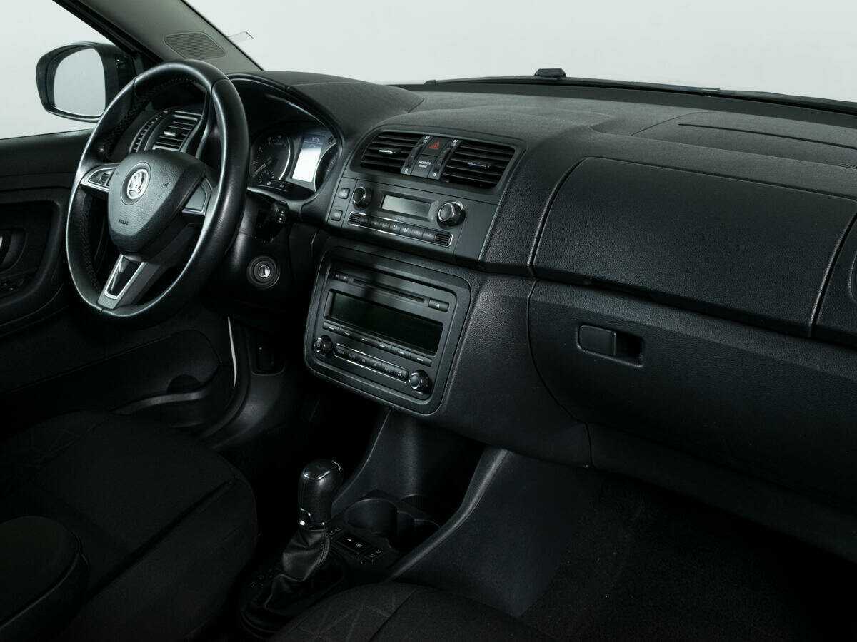 Skoda Fabia с пробегом — 2013 год. Фото: #6