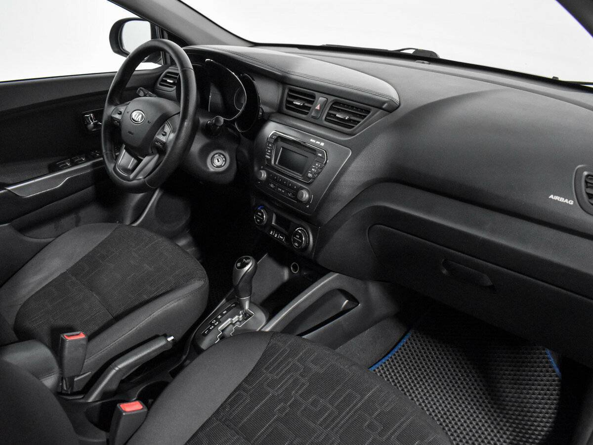 Kia Rio с пробегом — 2013 год. Фото: #12