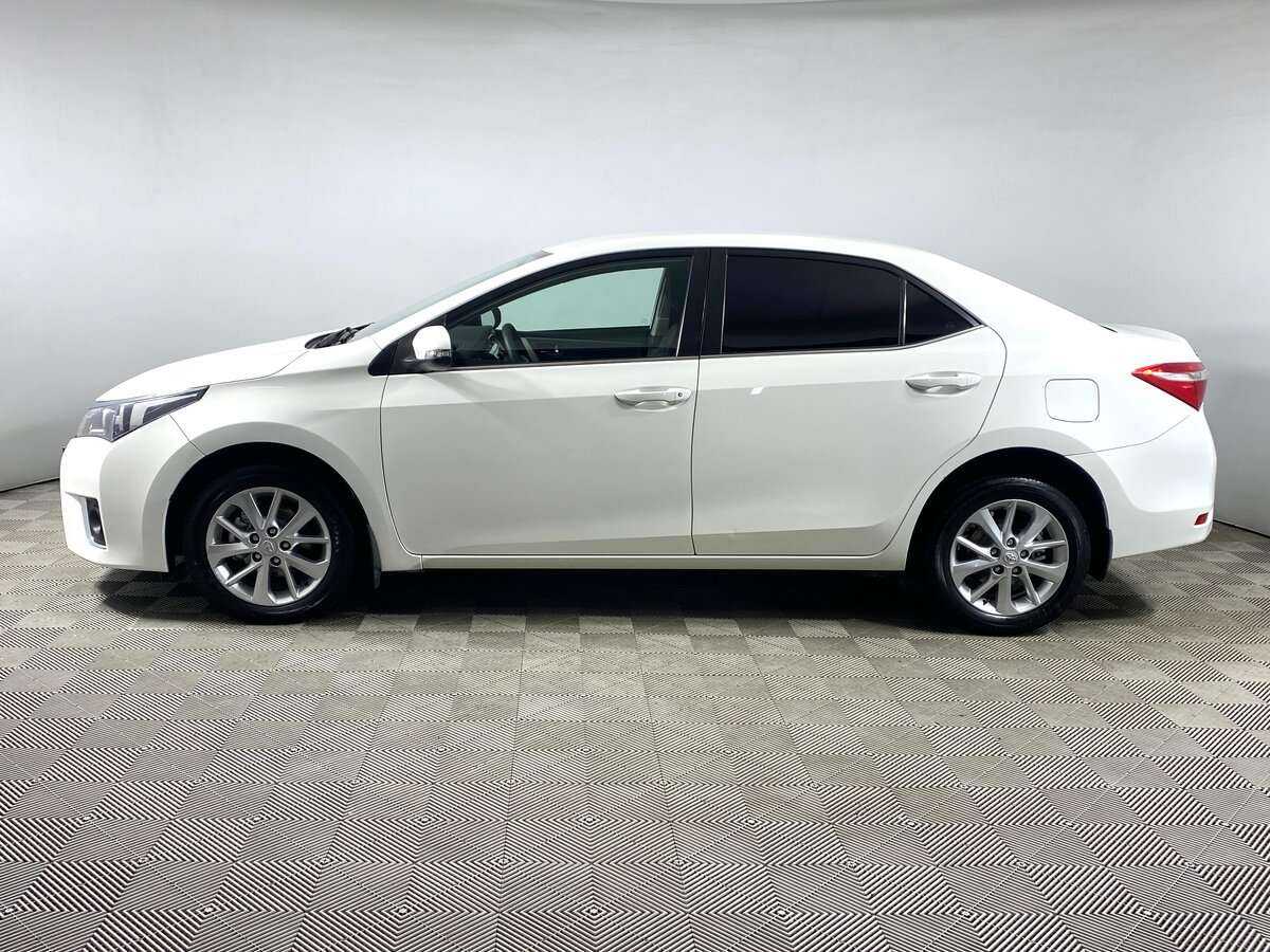 Toyota Corolla с пробегом — 2013 год. Фото: #7