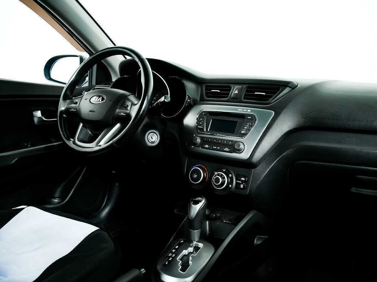 Kia Rio с пробегом — 2014 год. Фото: #8