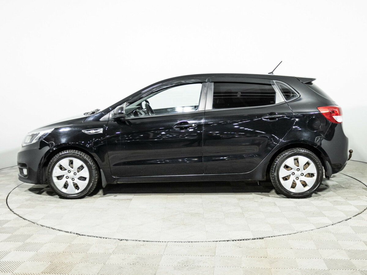 Kia Rio с пробегом — 2015 год. Фото: #7