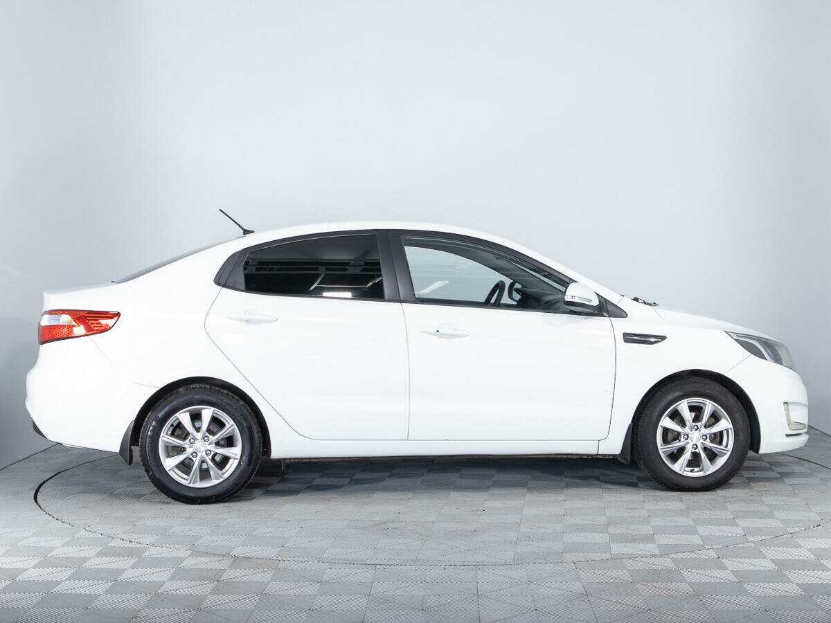 Kia Rio с пробегом — 2012 год. Фото: #3