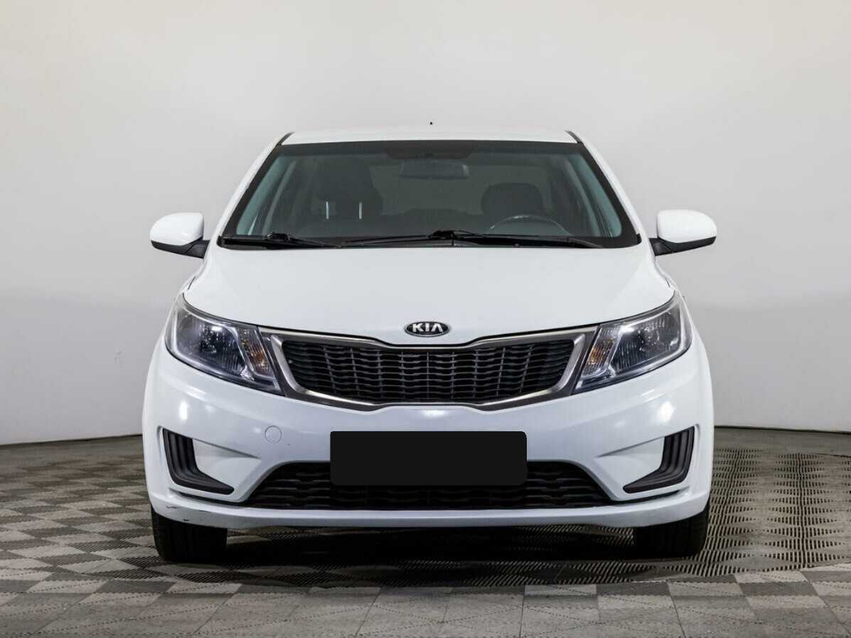 Kia Rio с пробегом — 2014 год. Фото: #1