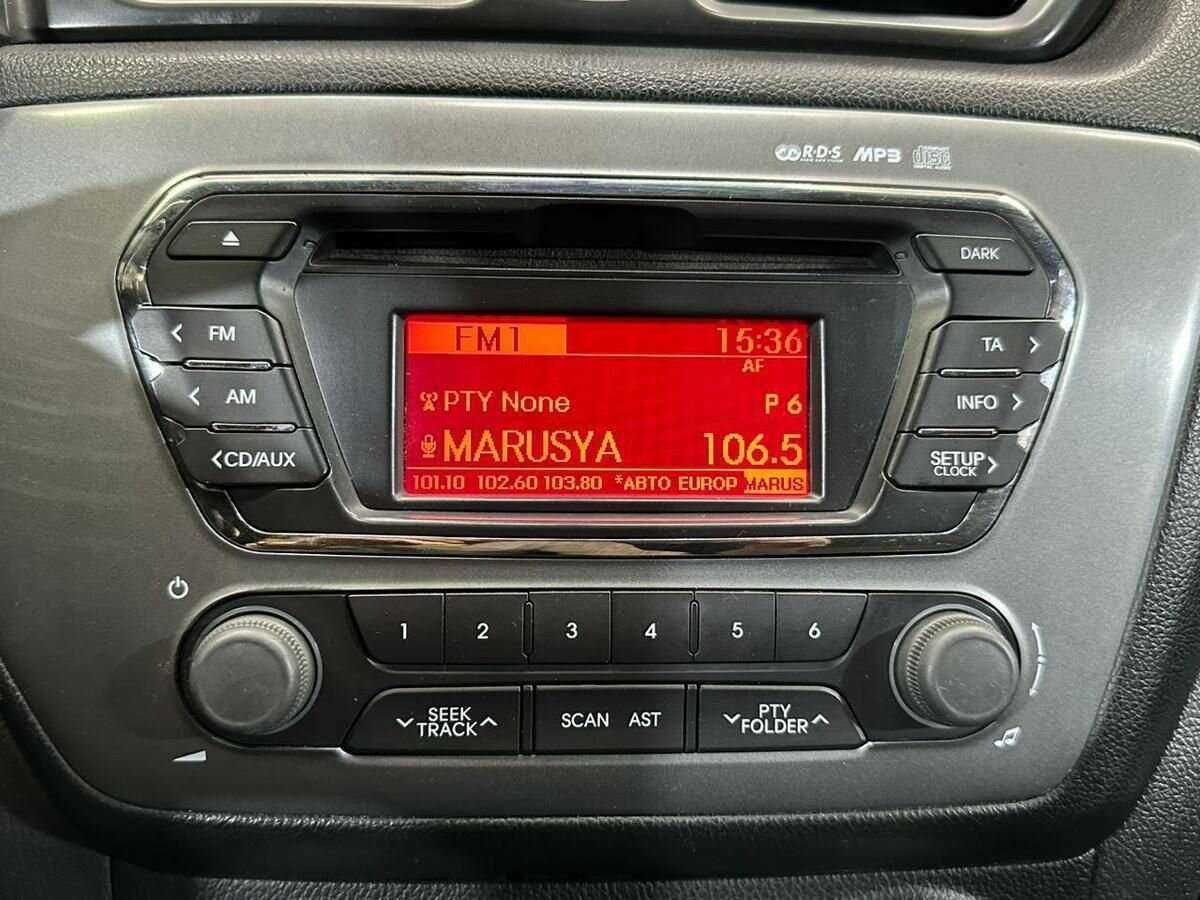 Kia Rio с пробегом — 2014 год. Фото: #12