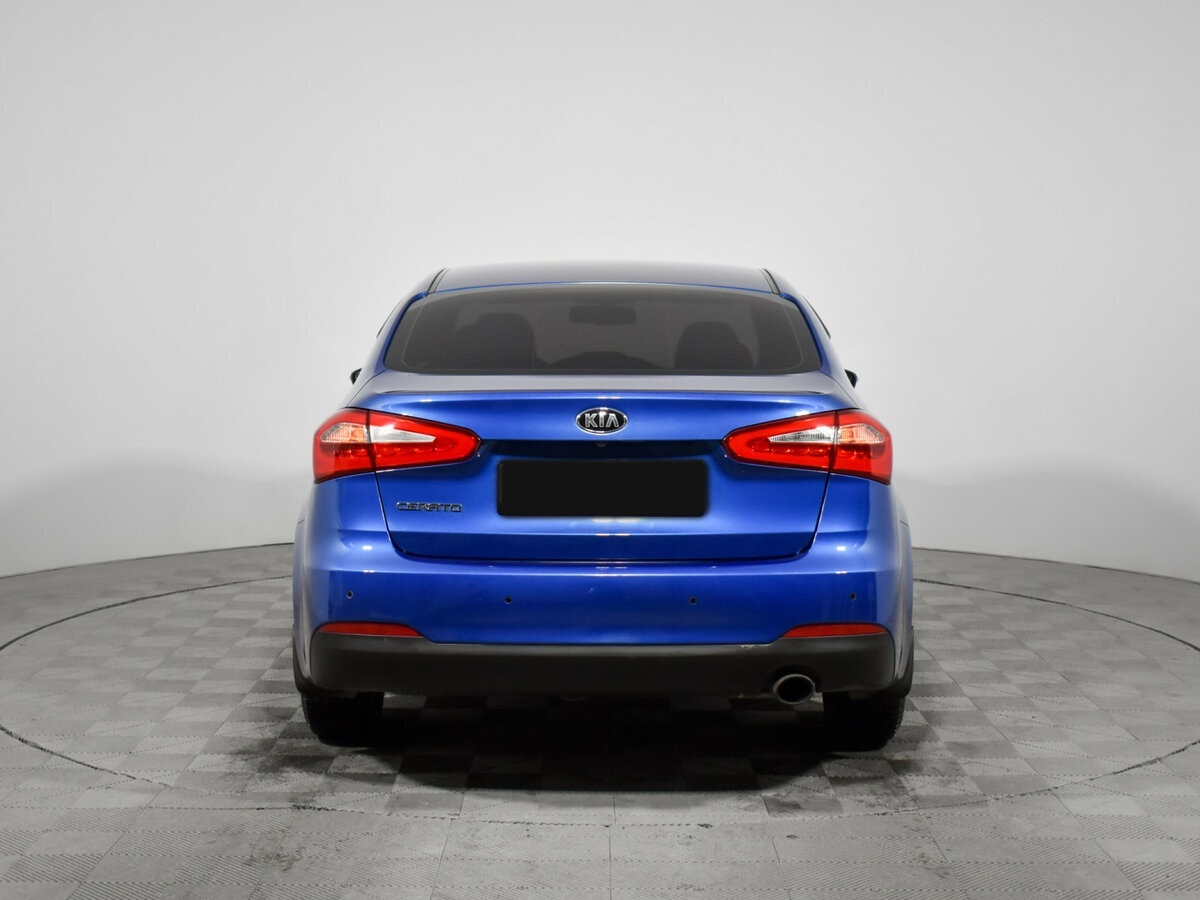 Kia Cerato с пробегом — 2014 год. Фото: #5