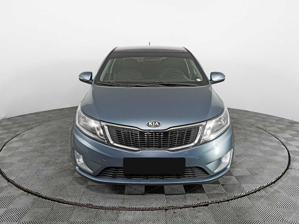 Kia Rio с пробегом — 2013 год. Фото: #1