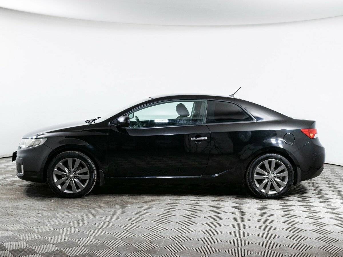 Kia Cerato с пробегом — 2012 год. Фото: #7