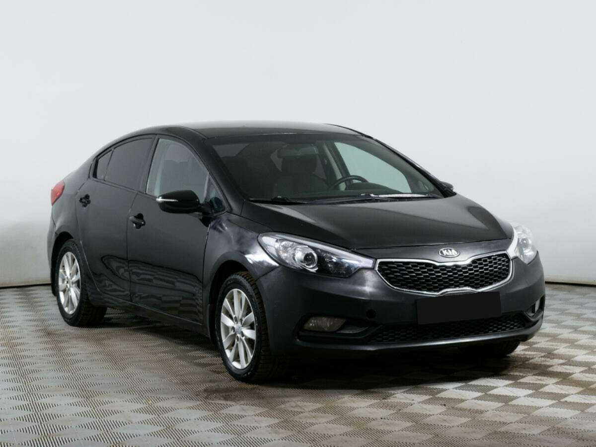 Kia Cerato с пробегом — 2014 год. Фото: #2