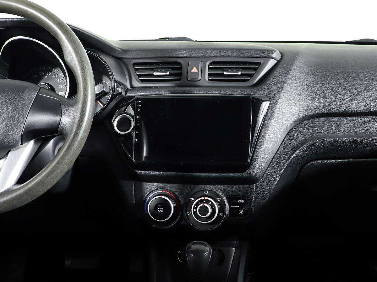 Kia Rio с пробегом — 2013 год. Фото: #11