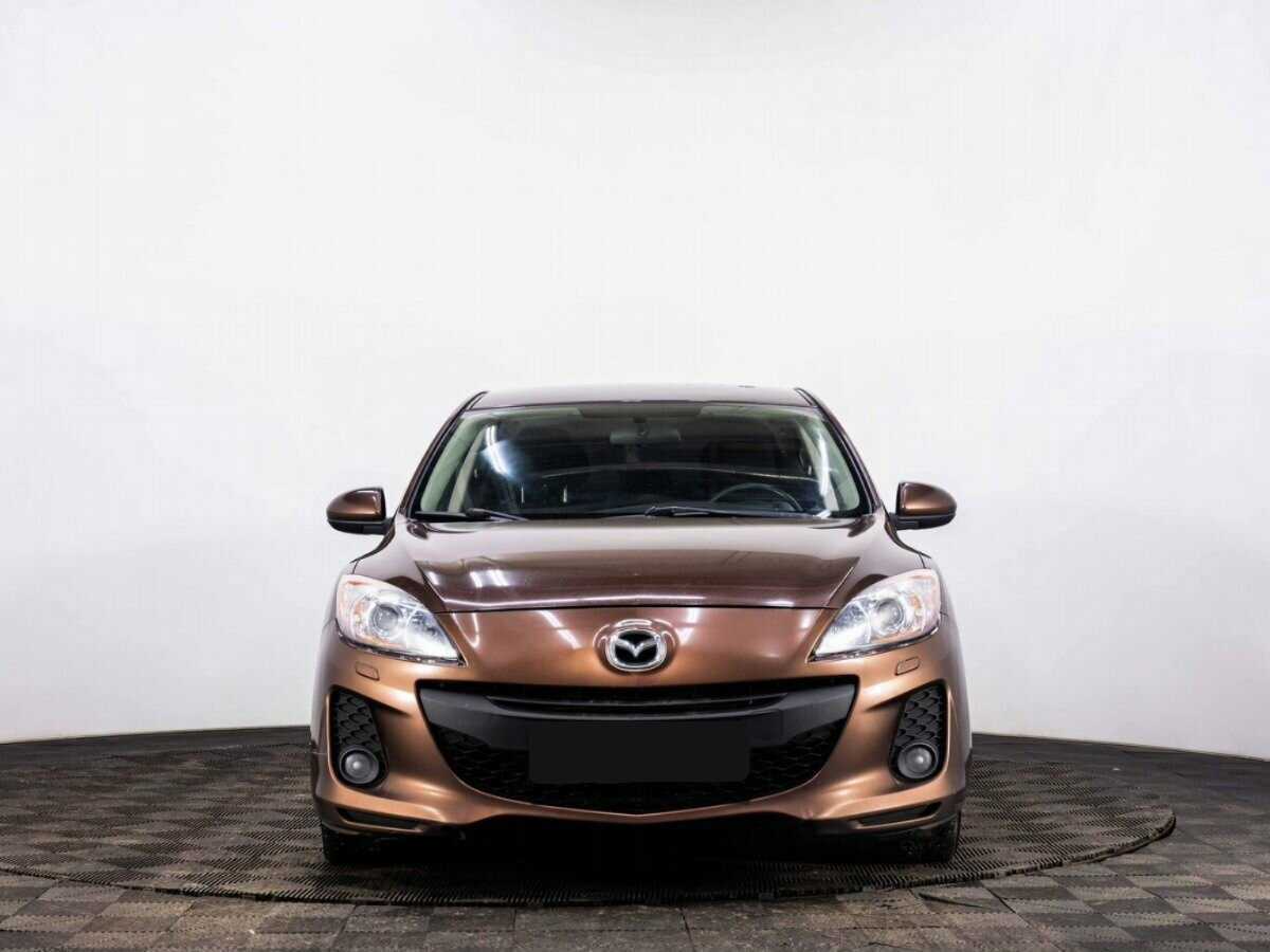 Mazda 3 с пробегом — 2012 год. Фото: #1