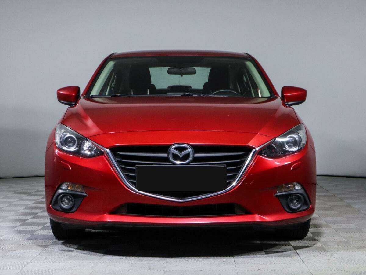 Mazda 3 с пробегом — 2014 год. Фото: #1