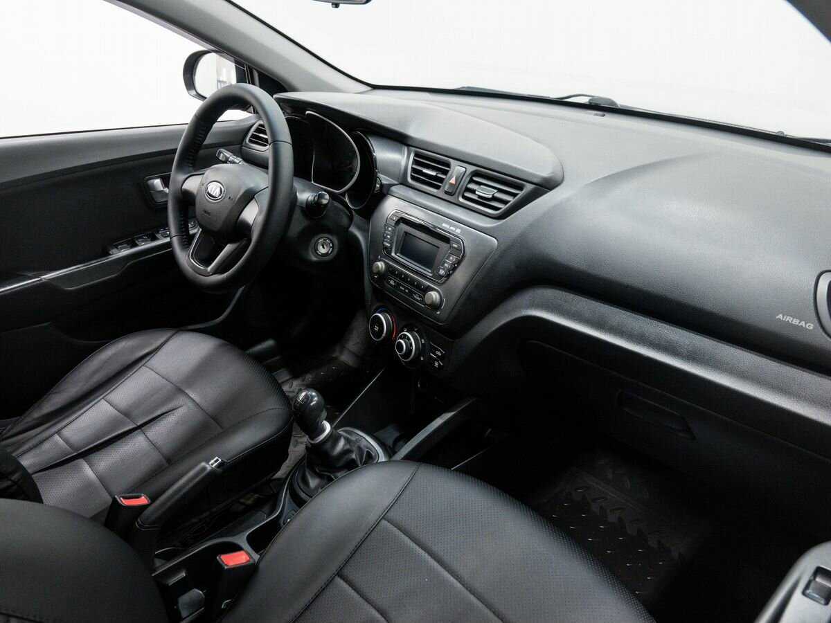 Kia Rio с пробегом — 2013 год. Фото: #7