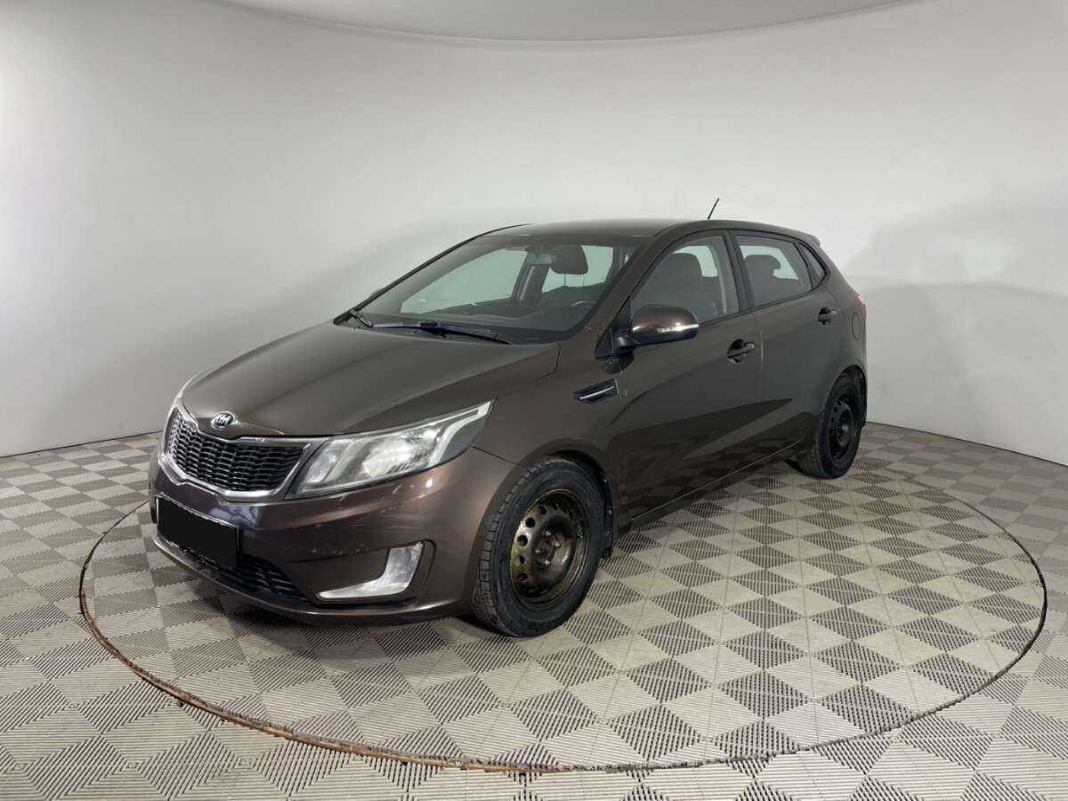 Kia Rio с пробегом — 2014 год. Фото: #0