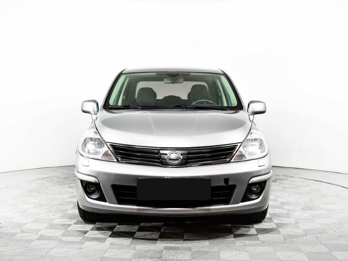 Nissan Tiida с пробегом — 2013 год. Фото: #1