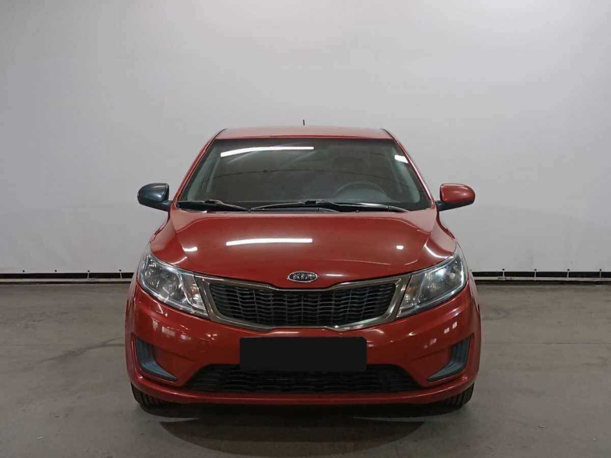 Kia Rio с пробегом — 2012 год. Фото: #1