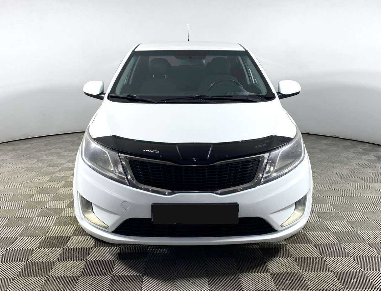 Kia Rio с пробегом — 2014 год. Фото: #1