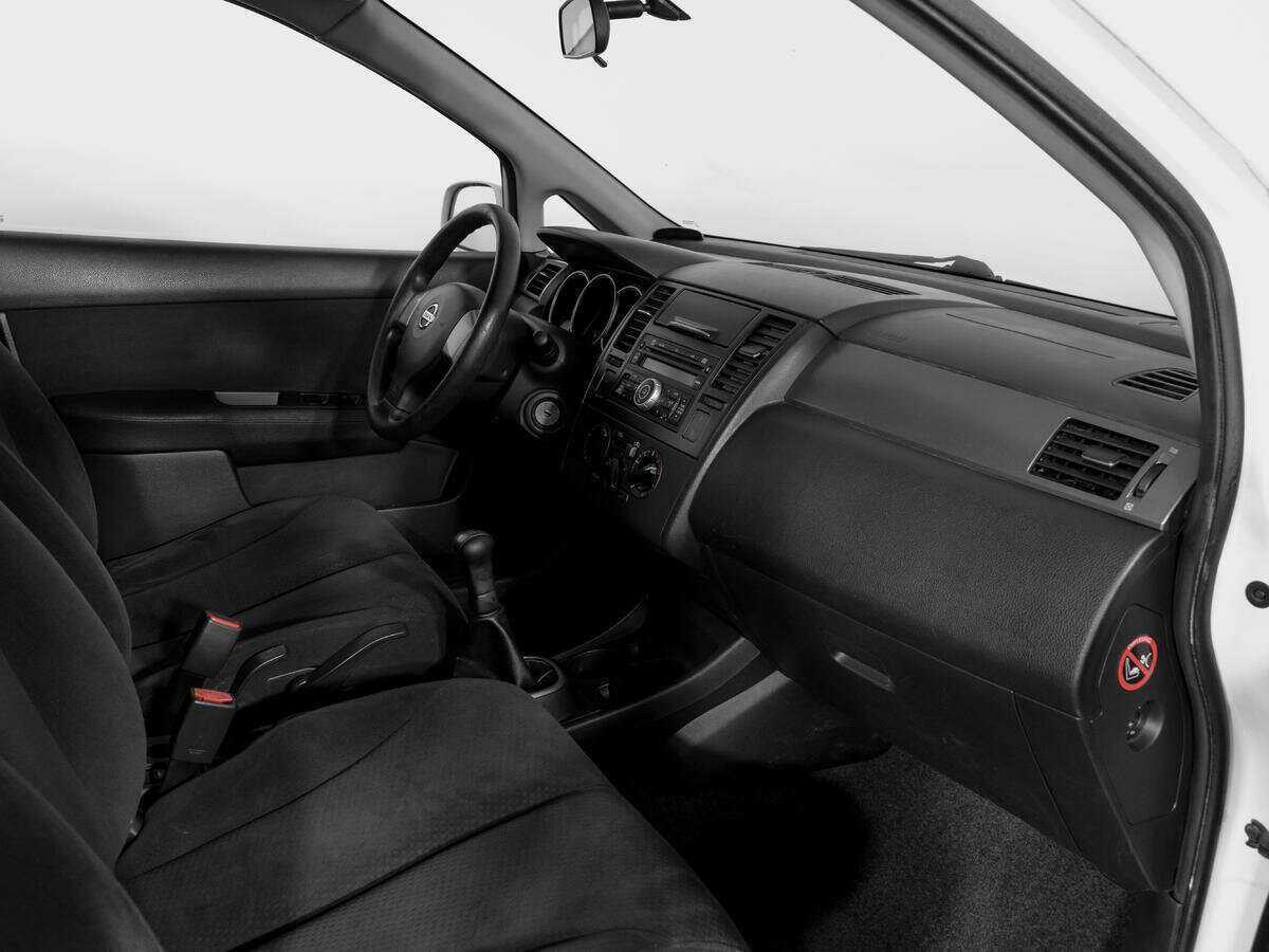 Nissan Tiida с пробегом — 2013 год. Фото: #7