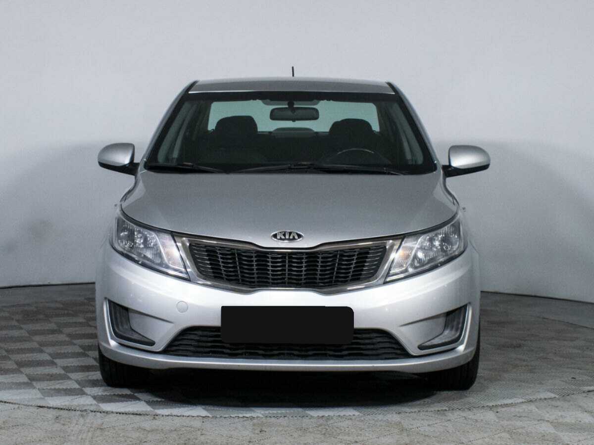 Kia Rio с пробегом — 2014 год. Фото: #1