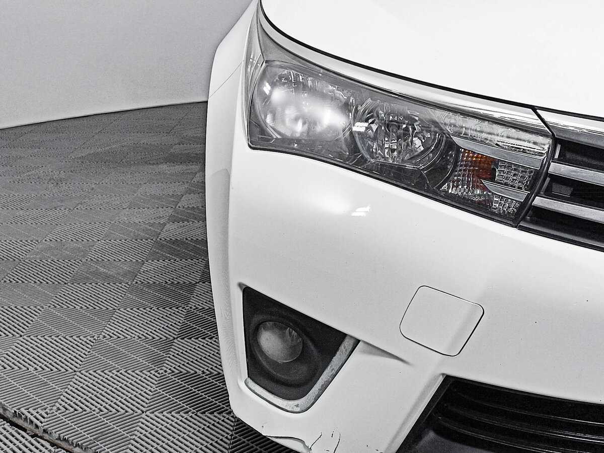 Toyota Corolla с пробегом — 2013 год. Фото: #15