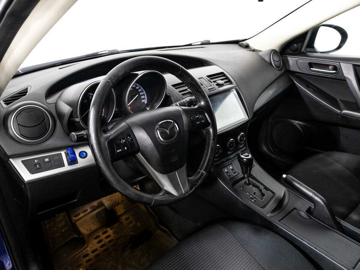 Mazda 3 с пробегом — 2012 год. Фото: #10
