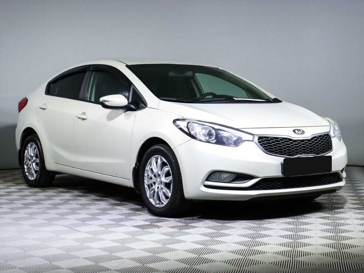 Kia Cerato с пробегом — 2014 год. Фото: #2