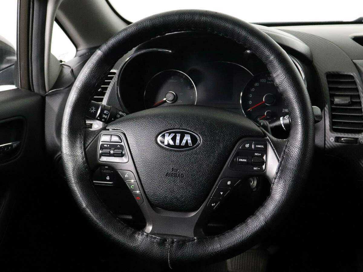 Kia Cerato с пробегом — 2015 год. Фото: #11