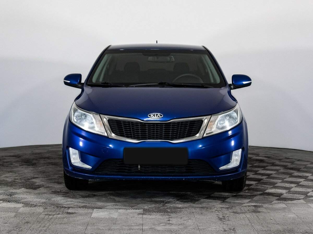 Kia Rio с пробегом — 2012 год. Фото: #1