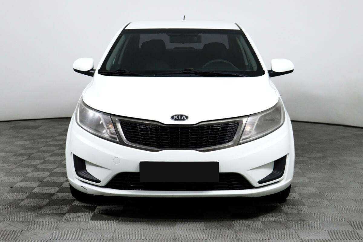 Kia Rio с пробегом — 2012 год. Фото: #1