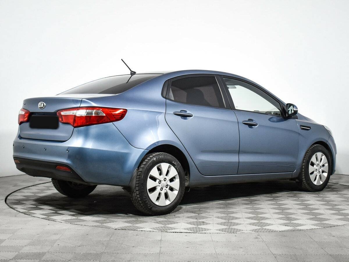 Kia Rio с пробегом — 2013 год. Фото: #4