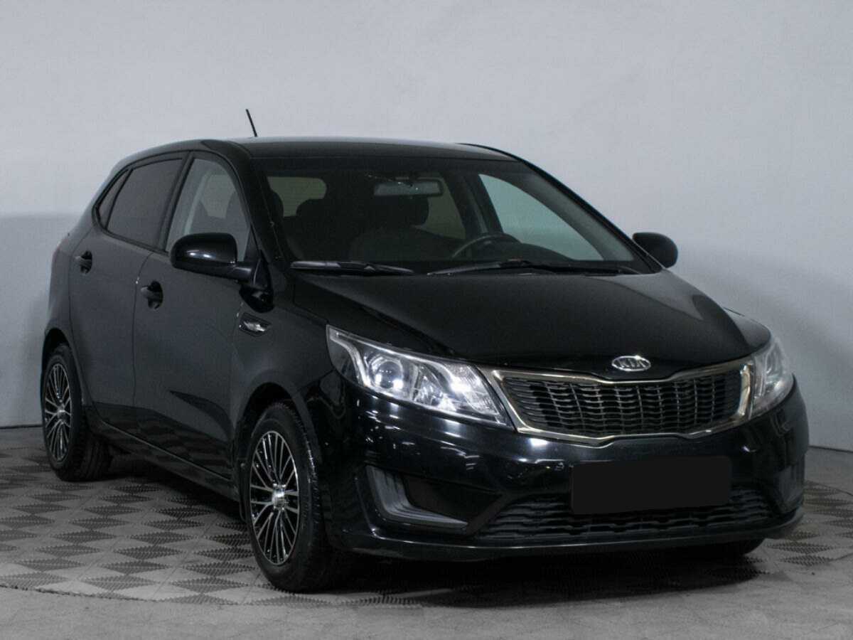 Kia Rio с пробегом — 2012 год. Фото: #2