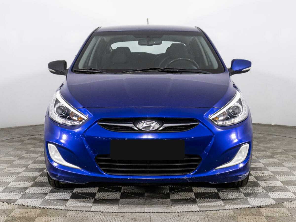 Hyundai Solaris с пробегом — 2013 год. Фото: #1