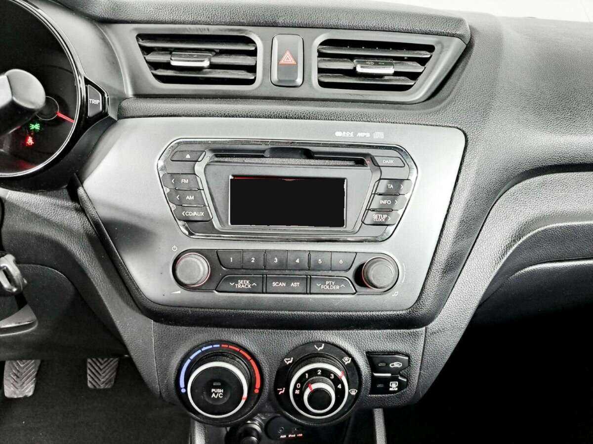 Kia Rio с пробегом — 2013 год. Фото: #14