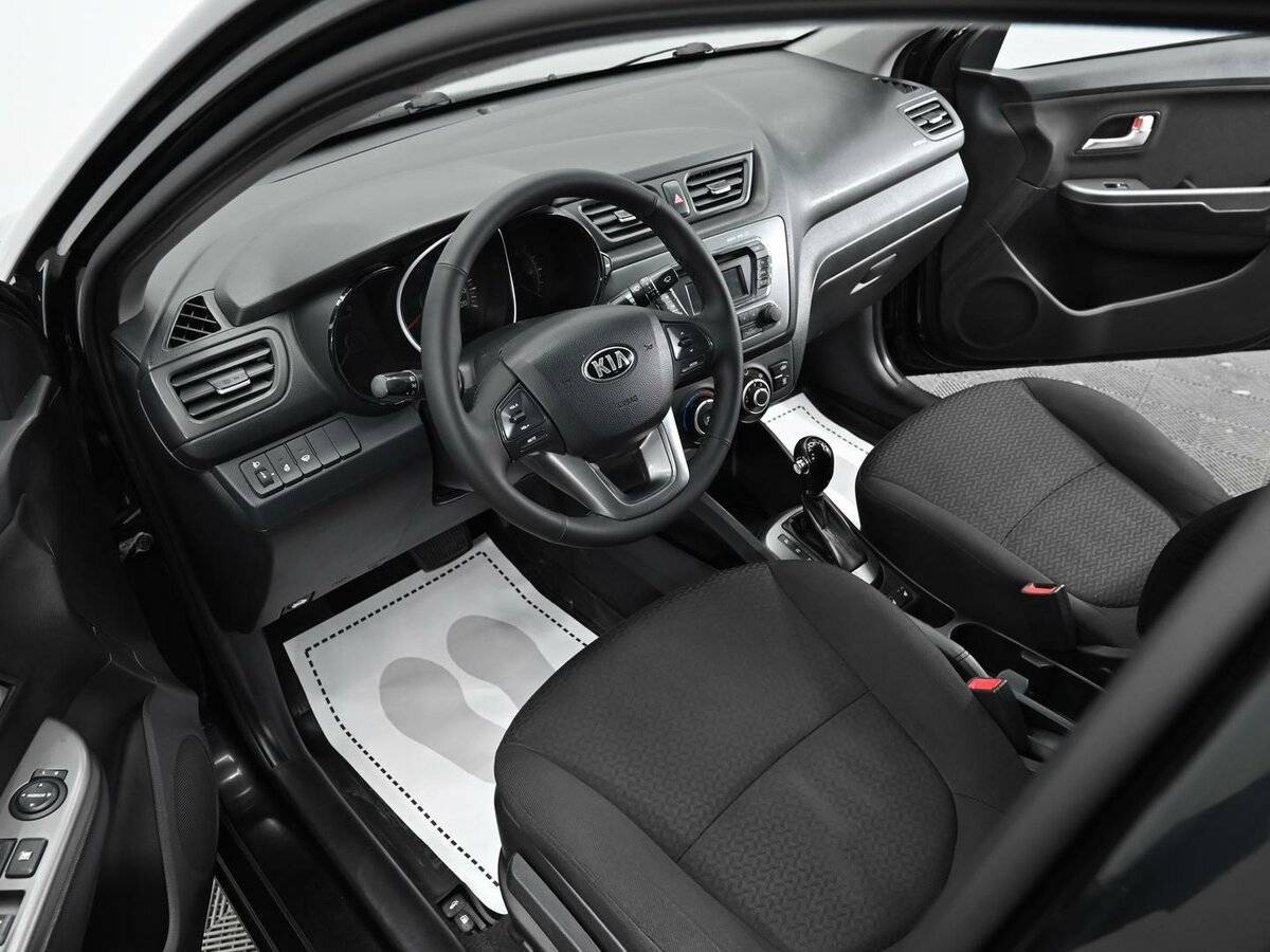 Kia Rio с пробегом — 2014 год. Фото: #6