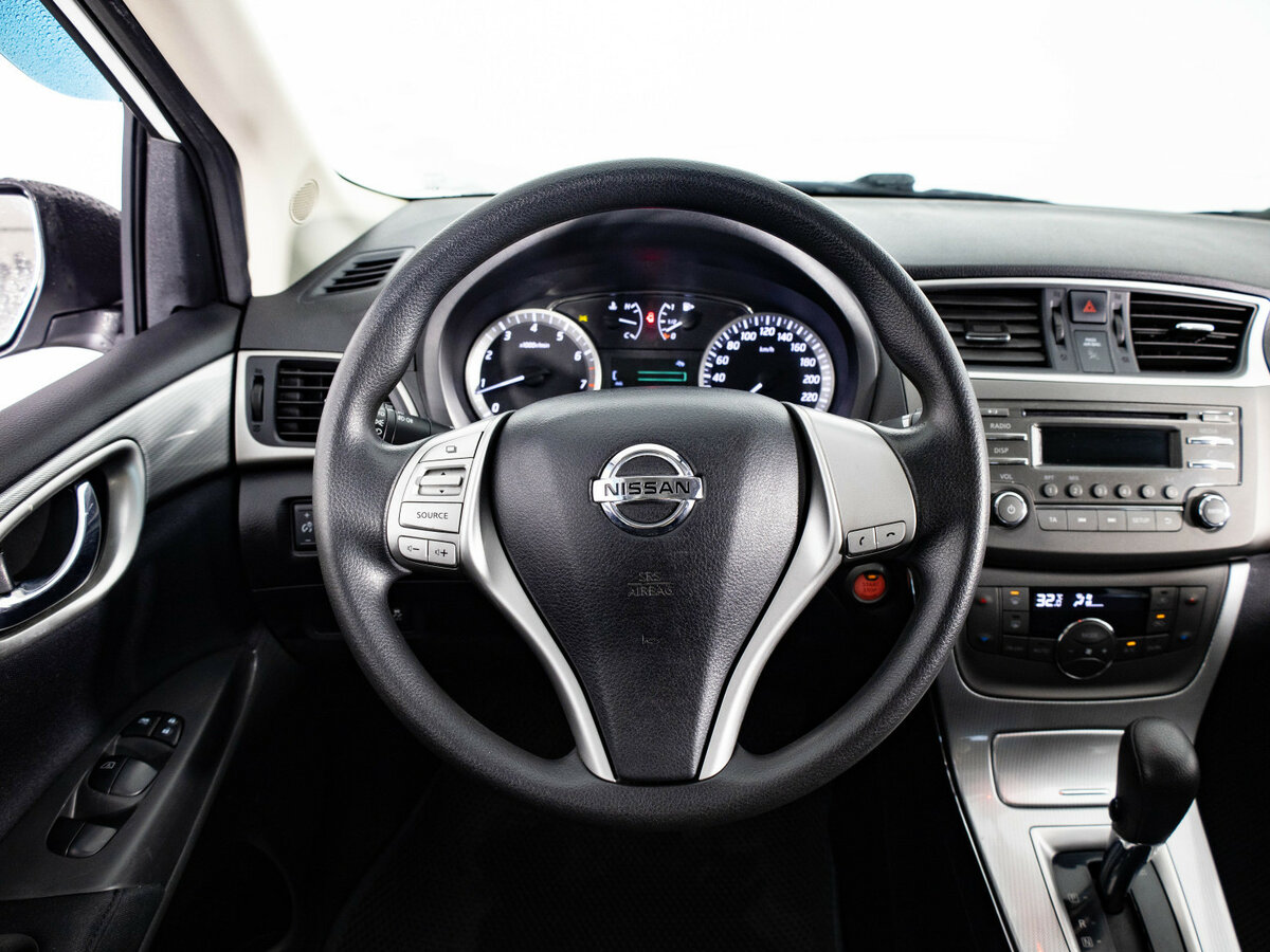 Nissan Tiida с пробегом — 2015 год. Фото: #8