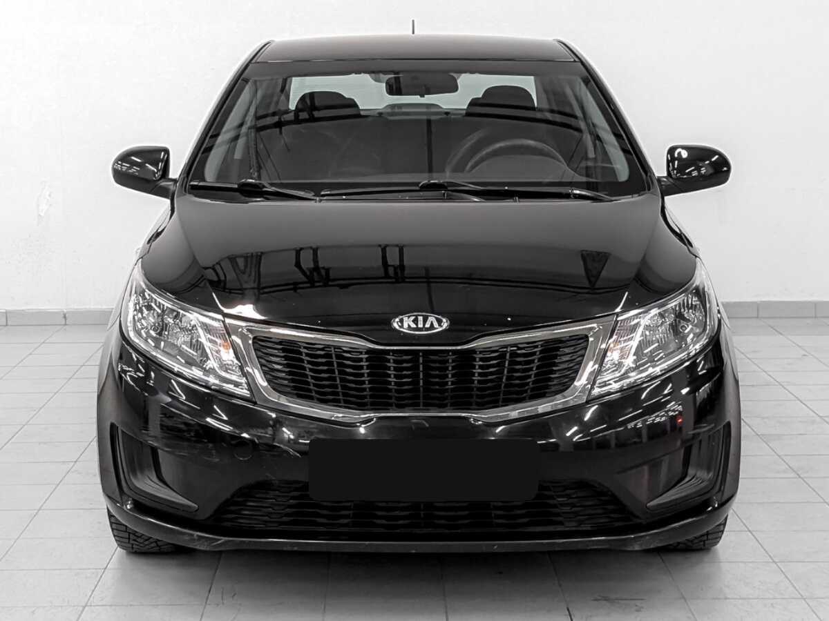 Kia Rio с пробегом — 2013 год. Фото: #1