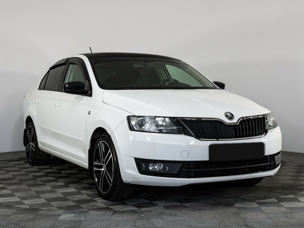 Skoda Rapid с пробегом — 2015 год. Фото: #2