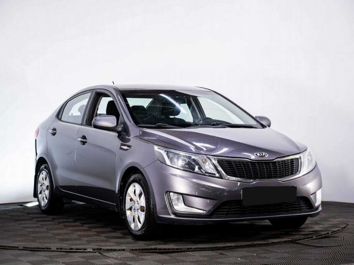 Kia Rio с пробегом — 2014 год. Фото: #2