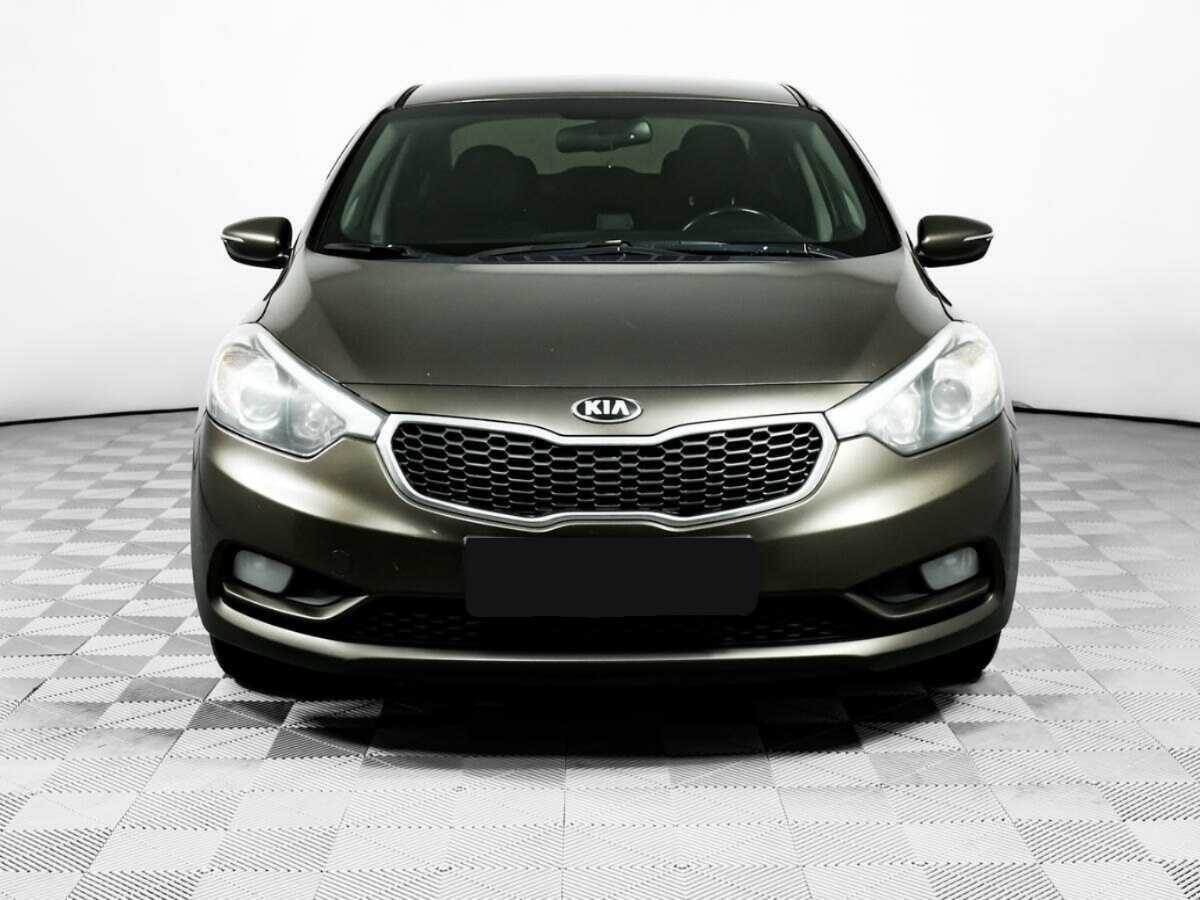 Kia Cerato с пробегом — 2014 год. Фото: #1